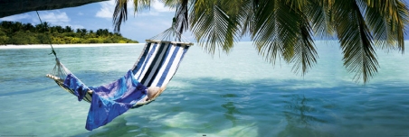 Hammock hanging over the Ocean - Tropical Beach